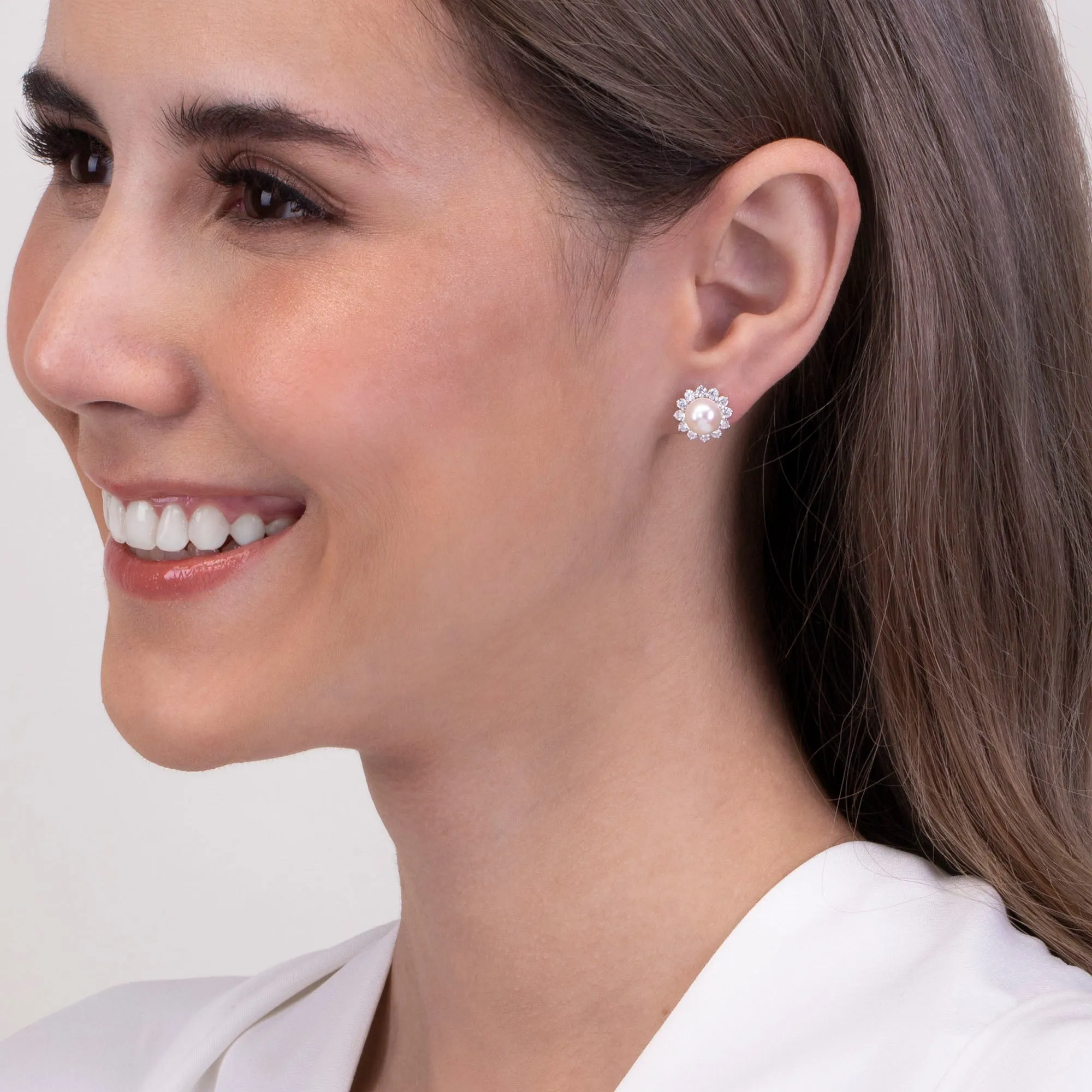 Classic Pearl: Silver rhodium plated 7 mm freshwater pearl with CZ floral halo stud earrings